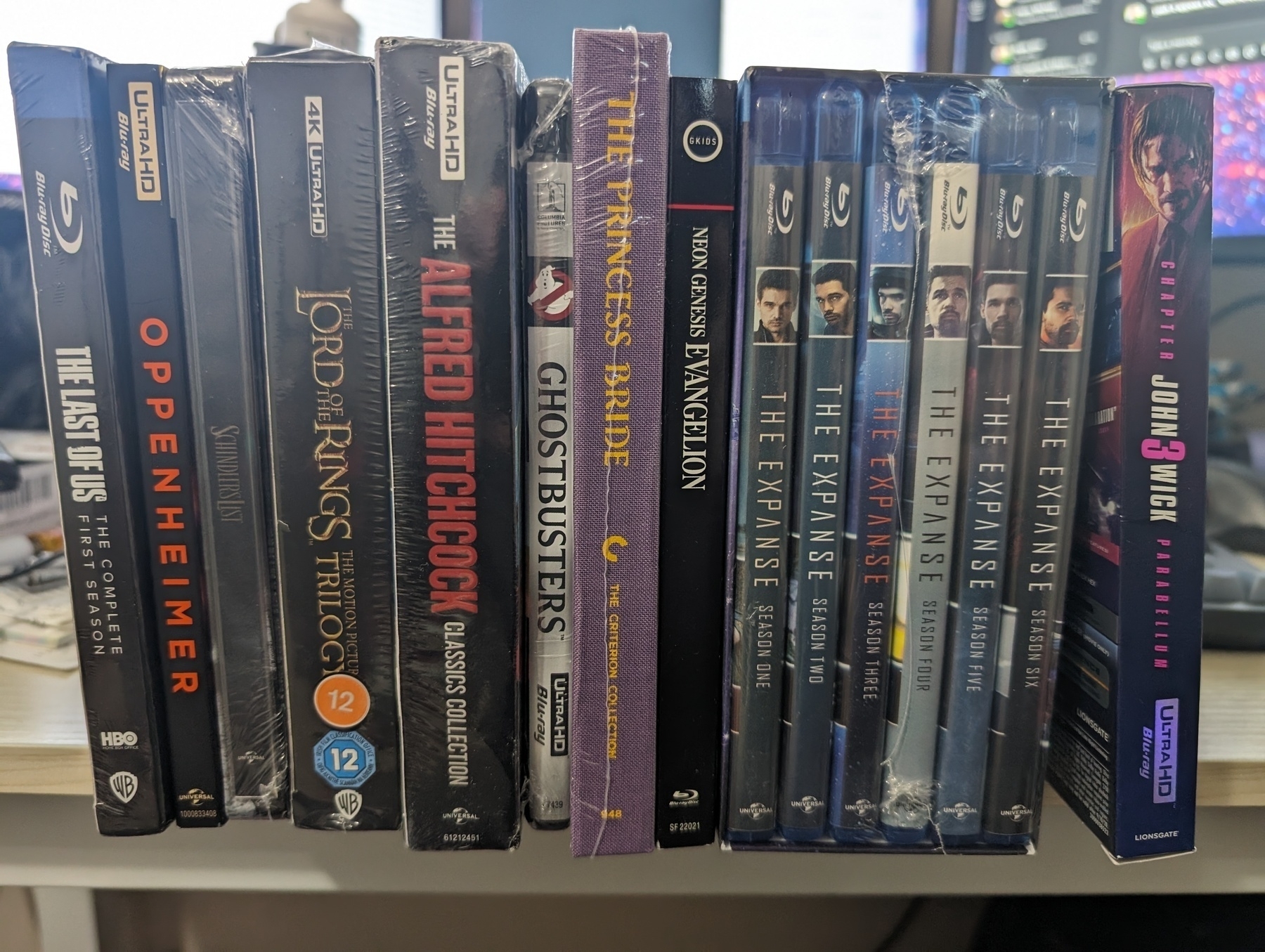 Photo of a small collection of Bluray and 4K Ultra movies and series.