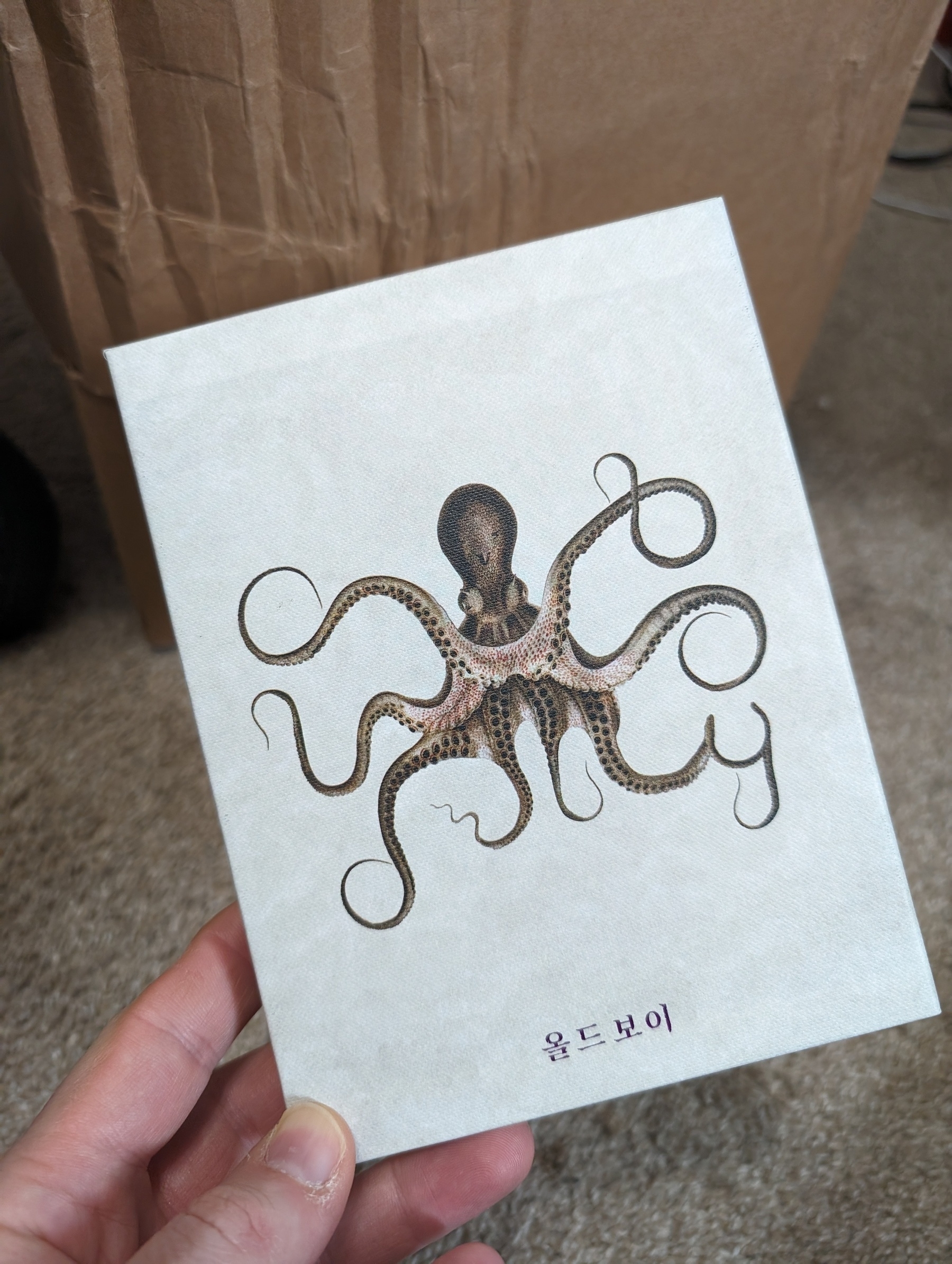 Photo of 4K Ultra HD casing for the special edition of Oldboy. Featured is an octopus, the arms of the octopus spell out the name, OLDBOY.