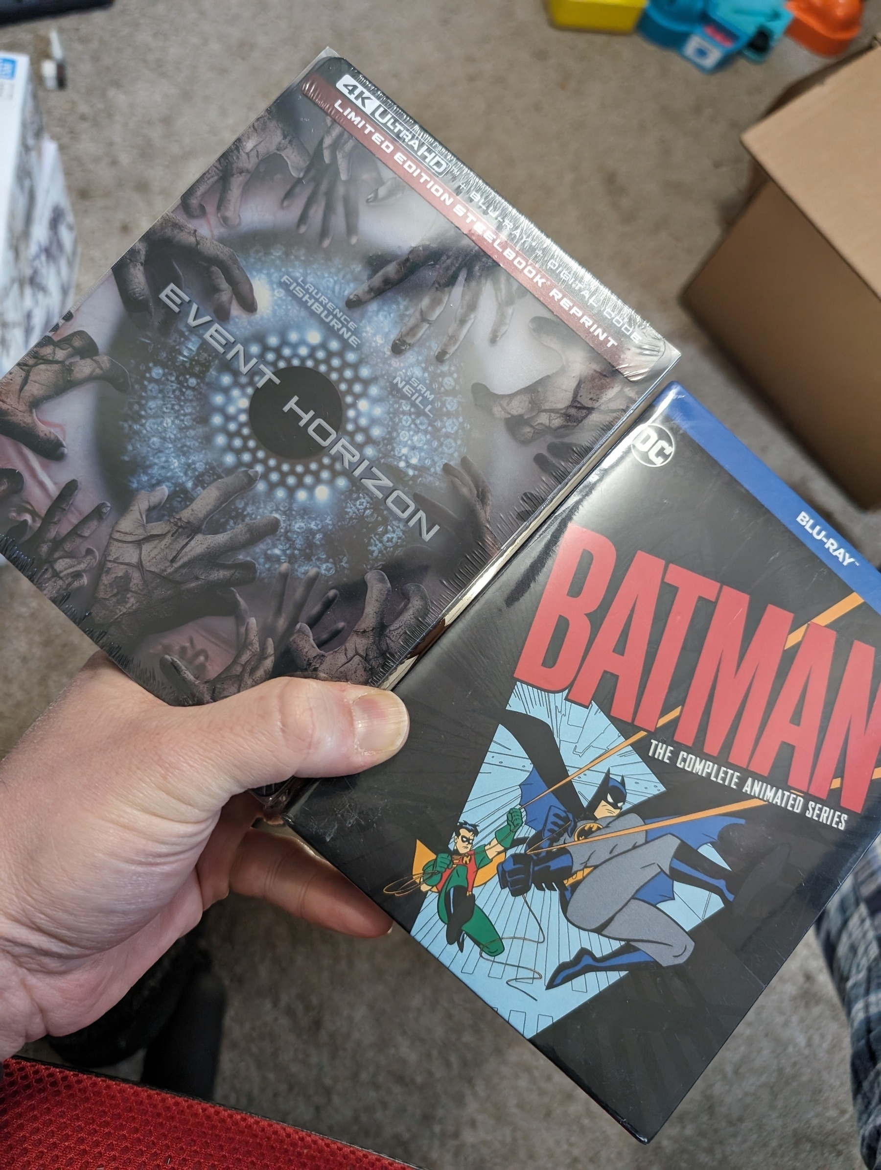 Photo of "Event Horizon Limited Edition Ultra 4K Steelbook" and "Batman - The Animated Series Blu-ray"