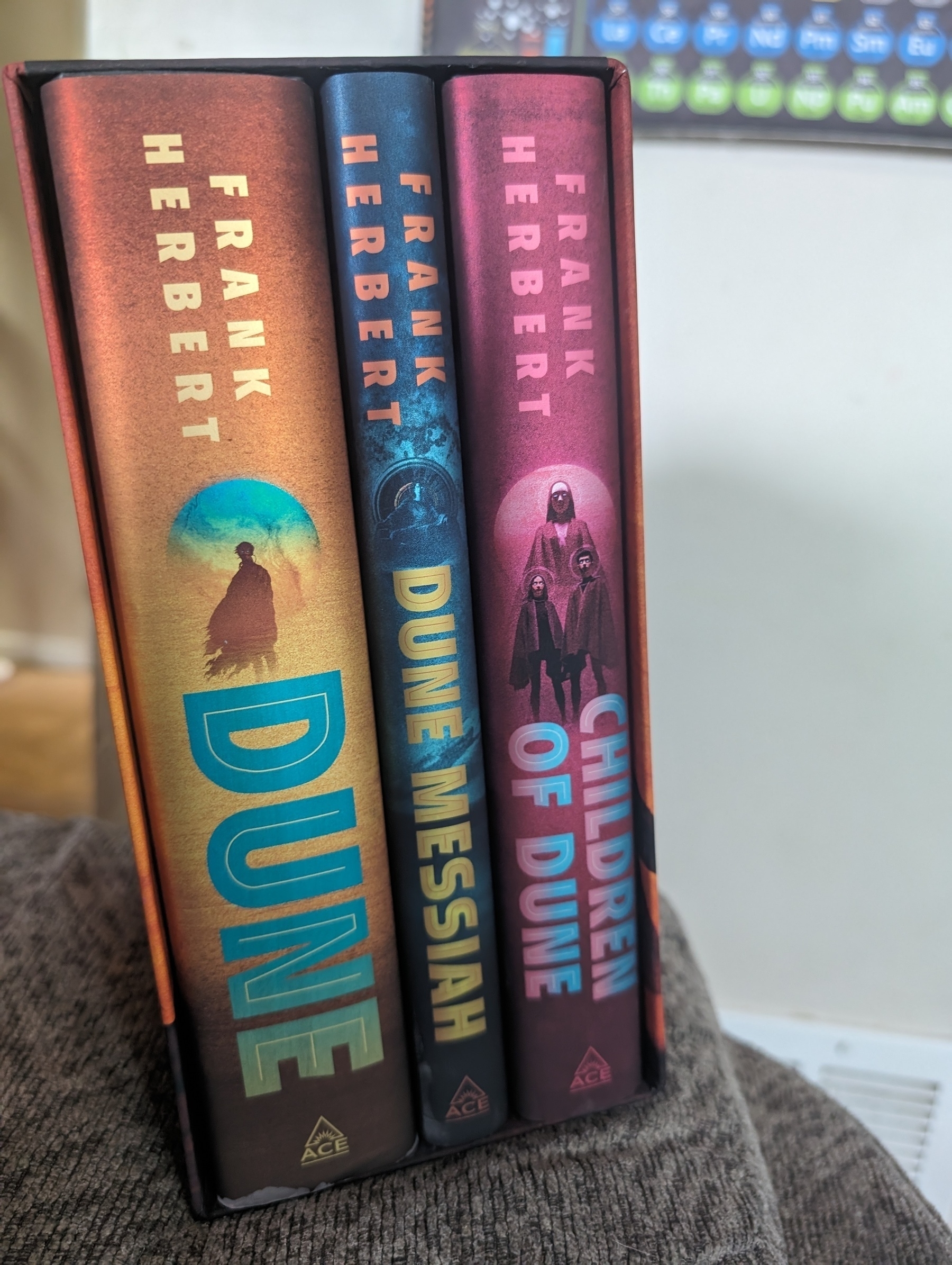 Photo of the three core Dune books from Frank Herbert. Dune, Dune Messiah and Children of Dune. This set is the new special edition cover hardback set with beautiful artwork and blue (spice blue, of course) edging on the pages.